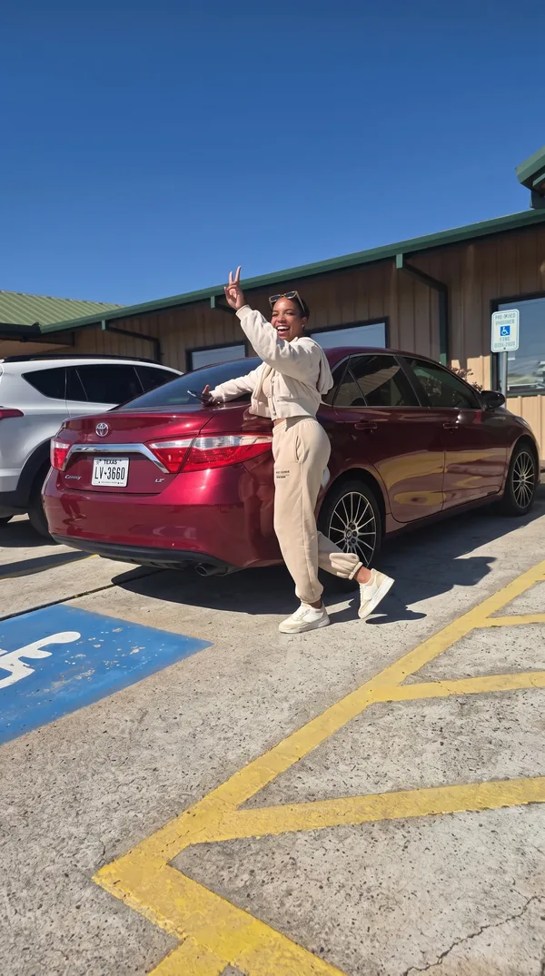 Pick & Ride Auto Sales customer with their new vehicle